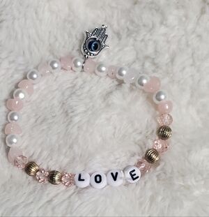 Pink and Gold Beaded Bracelet with Evil Eye Charm